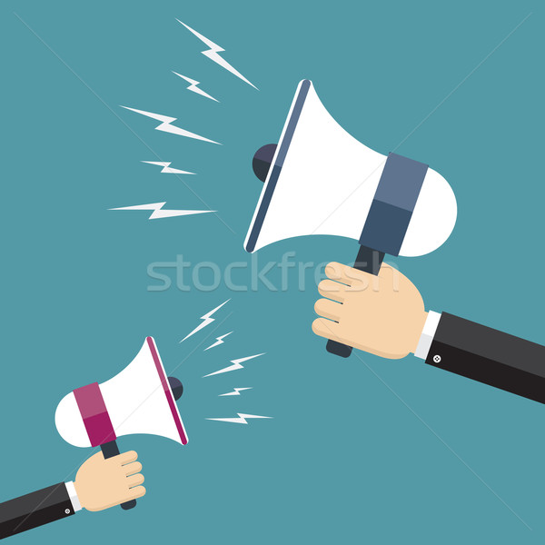 Two hands holding megaphones opposite each other. Stock photo © Neokryuger