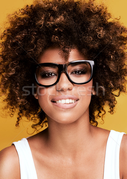 Laughing african american girl with afro. Stock photo © NeonShot