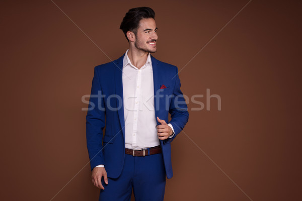 élégante jeunes affaires costume jeune homme coûteux Photo stock © NeonShot