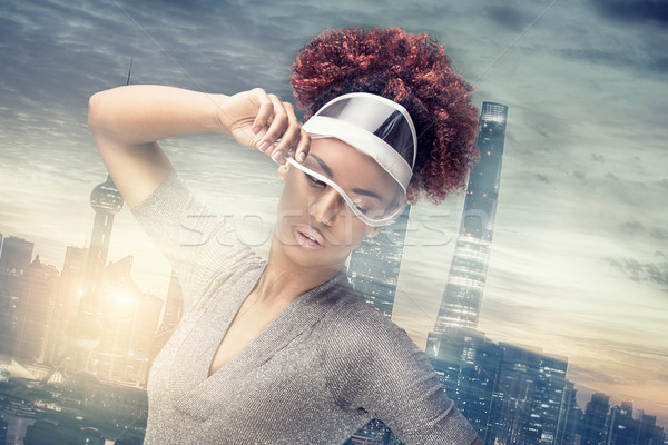 Beauty portrait of girl with afro hairstyle. Stock photo © NeonShot