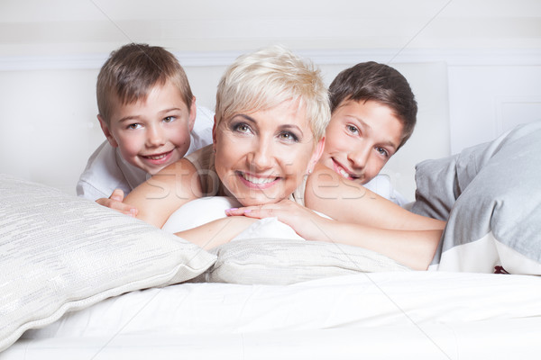 Stock photo: Family portrait, mother with sons.