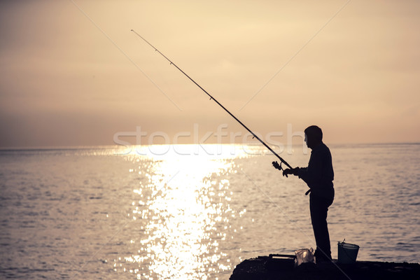 Man fishing at the morning. Stock photo © NeonShot
