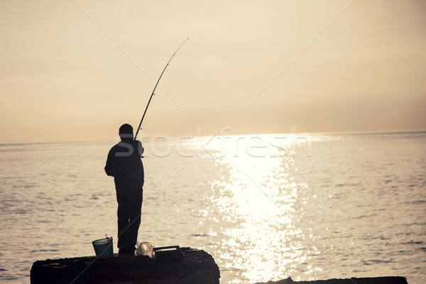 Man fishing at the morning. Stock photo © NeonShot