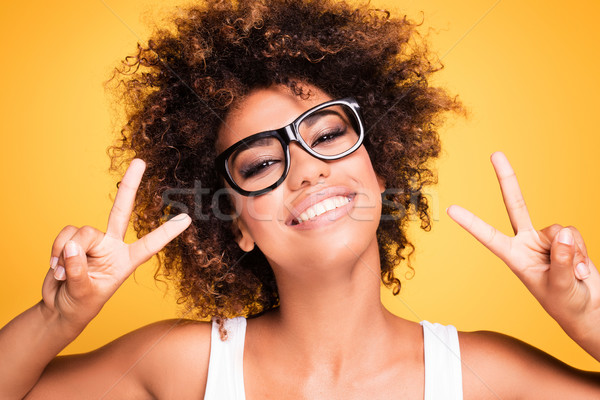 Laughing african american girl with afro. Stock photo © NeonShot