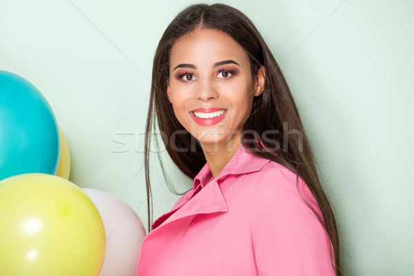 Happy young woman with balloons. Stock photo © NeonShot