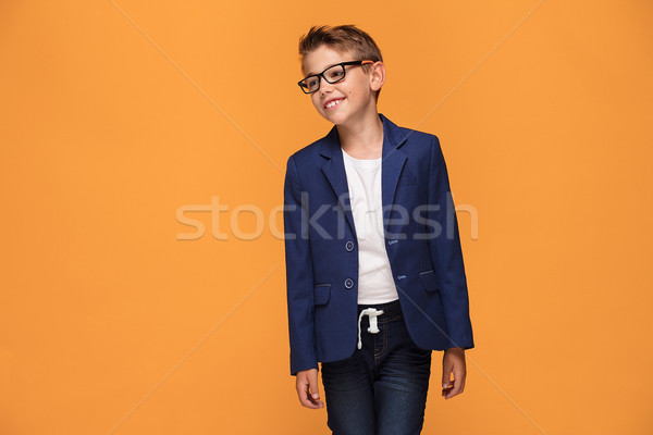 Smiling young elegant boy in eyeglasses. Stock photo © NeonShot