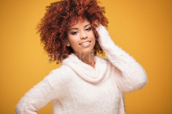 Portrait of beautiful woman with afro hairstyle. Stock photo © NeonShot