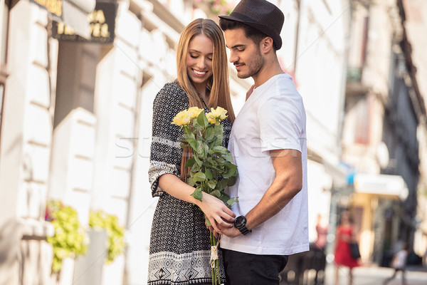 Beautiful couple with flowers dating. Stock photo © NeonShot