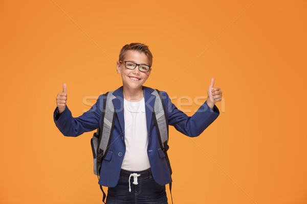 Weinig schooljongen rugzak glimlachend bril permanente Stockfoto © NeonShot