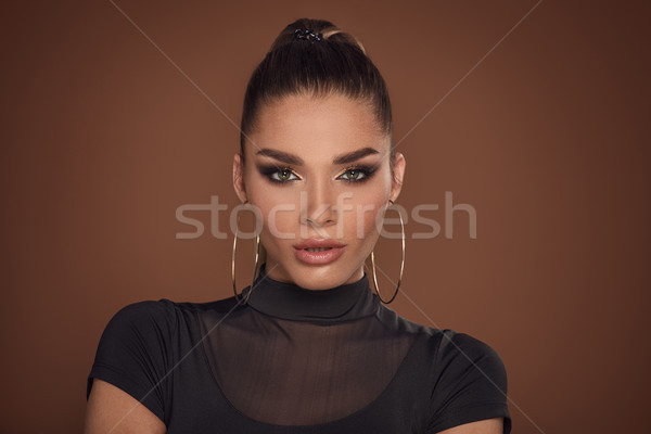 Cara mulher atraente dourado make-up beleza retrato Foto stock © NeonShot