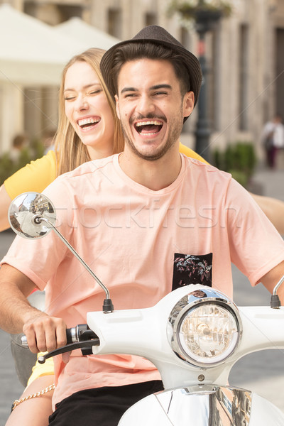 Couple in love riding on a scooter. Stock photo © NeonShot