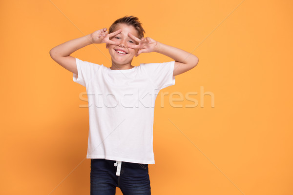 Stock foto: Jungen · gefühlvoll · wenig · Junge · orange · Studio