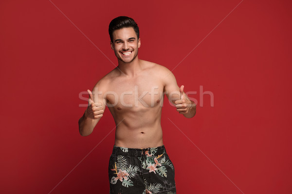 Frumos fericit om prezinta topless barbat frumos Imagine de stoc © NeonShot