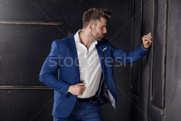 Yakışıklı adam poz stüdyo zarif takım elbise Stok fotoğraf © NeonShot