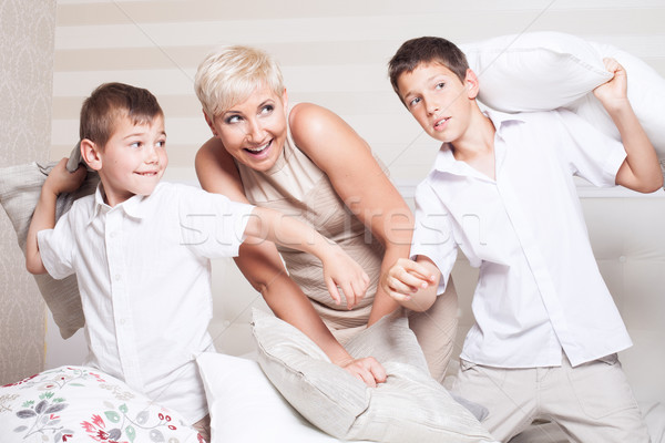 Aile yastık kavgası gülen anne iki Stok fotoğraf © NeonShot