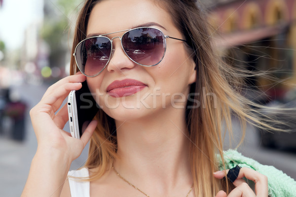 Portre gülen kız konuşma cep telefonu güzel Stok fotoğraf © NeonShot