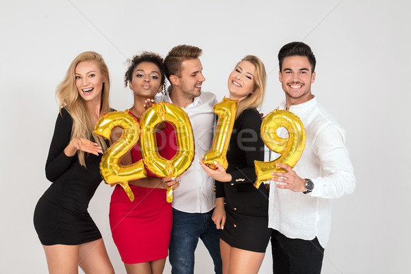 Party people celebrating new years eve. Stock photo © NeonShot