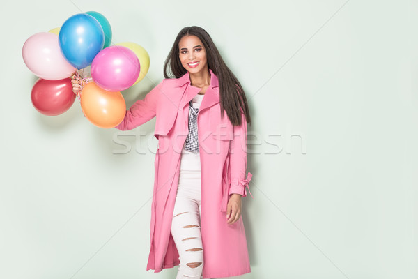 Happy young woman with balloons. Stock photo © NeonShot