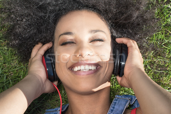 African american girl with headphones. Stock photo © NeonShot