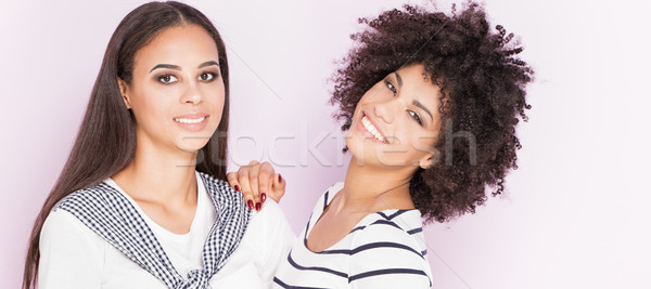 Two african american girls having fun. Stock photo © NeonShot