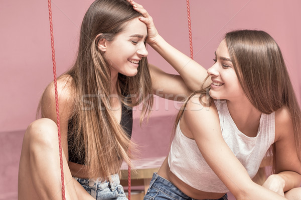 美しい 双子 姉妹 笑みを浮かべて 一緒に 幸せ ストックフォト © NeonShot