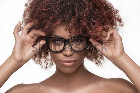 Afro girl in eyeglasses, smiling. Stock photo © NeonShot
