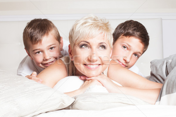 Stock photo: Family portrait, two brothers with mum.