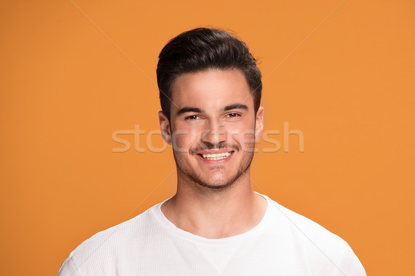 Portrait of handsome smiling man. Stock photo © NeonShot