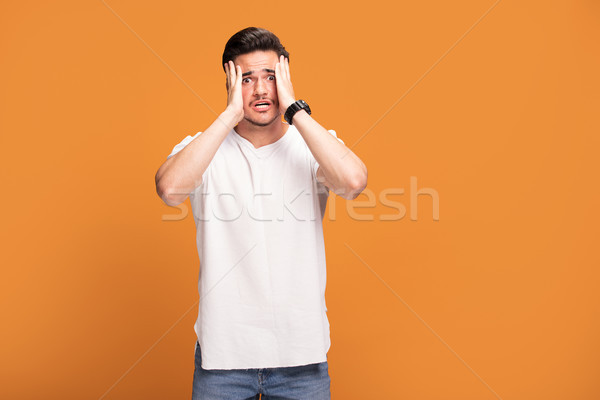 失望した 若い男 黄色 ハンサム 小さな 男 ストックフォト © NeonShot