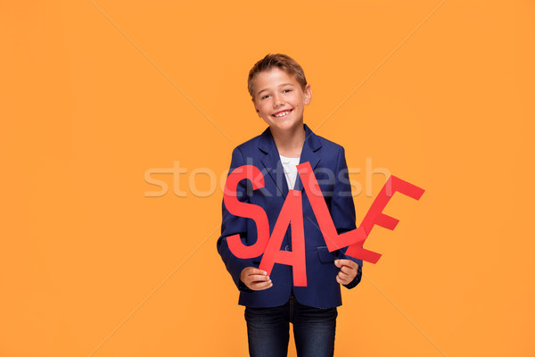 [[stock_photo]]: élégante · garçon · vente · lettres · peu