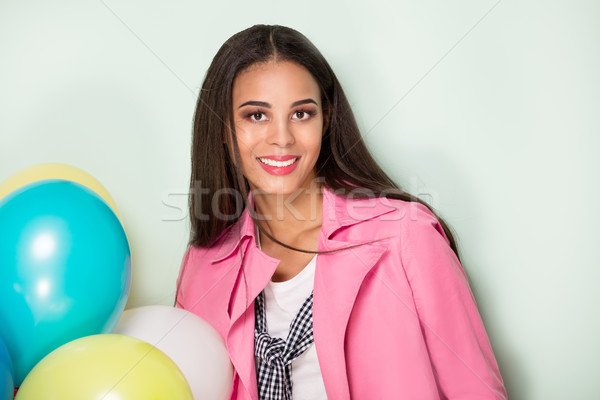 Happy young woman with balloons. Stock photo © NeonShot