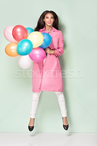 Happy young woman with balloons. Stock photo © NeonShot