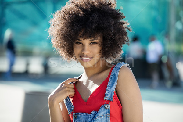 Girl with afro posing, smiling. Stock photo © NeonShot