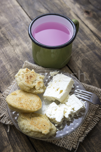 Freshly baked cornbread and white cheese  Stock photo © nessokv