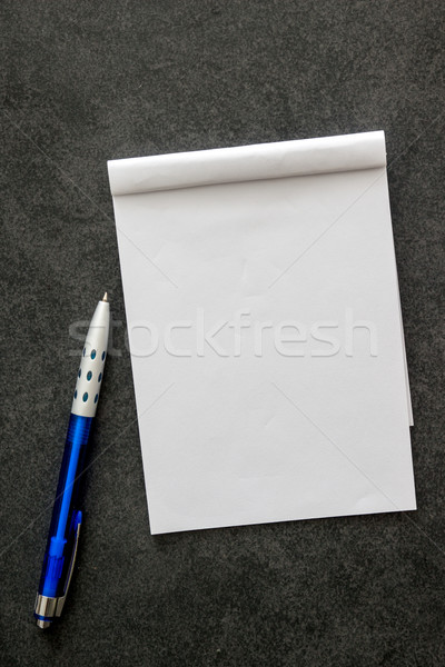 Stock photo: Blank notepad and pen