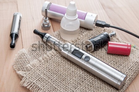 E-cigarette equipmen on table Stock photo © nessokv