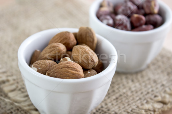 Almonds kernel in a bowl Stock photo © nessokv