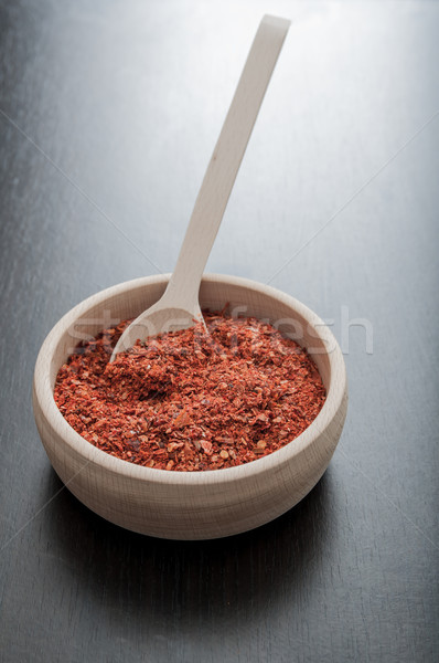 Ground paprika in a wooden bowl Stock photo © nessokv