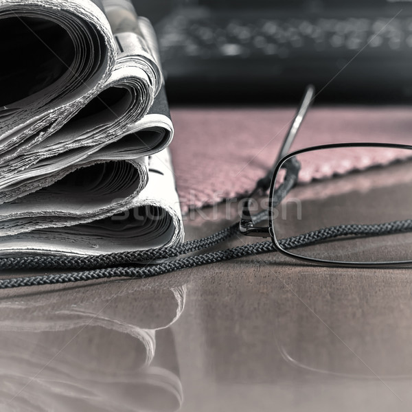 pile of newspaper & glasses Stock photo © nessokv