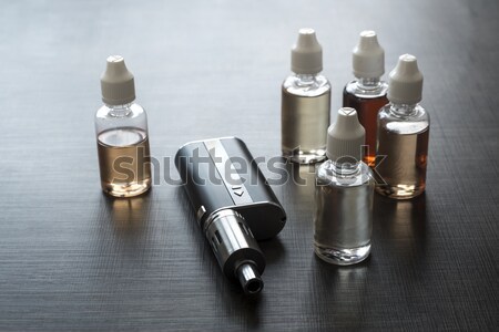 electronic cigarette on old wooden table Stock photo © nessokv