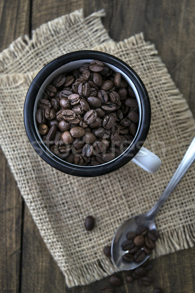 Grains de café émail mug bois Photo stock © nessokv