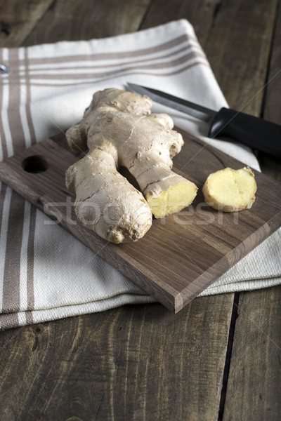 Fresh ginger root on a cutting board Stock photo © nessokv