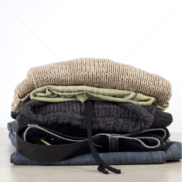 Stack of clothes on a Wooden table Stock photo © nessokv