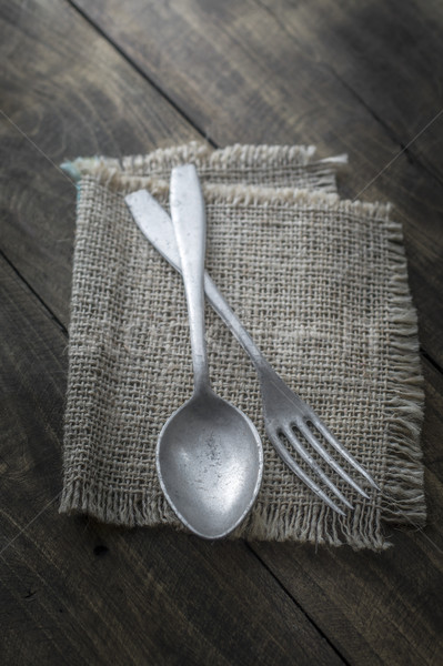 Old cutlery on wooden table Stock photo © nessokv