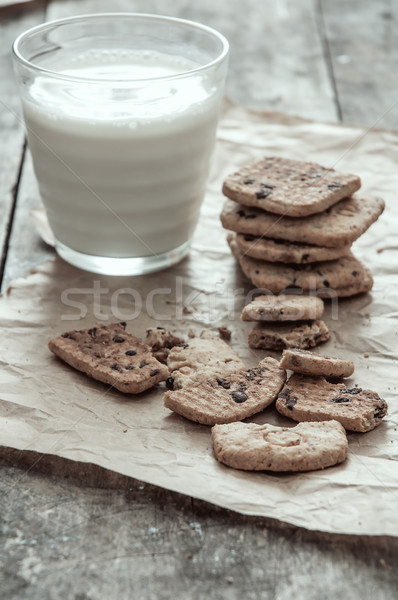 Stack of Chocolate chip cookie and glass of milk Stock photo © nessokv