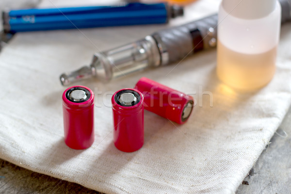 advanced vaping device, e-cigarette on table Stock photo © nessokv
