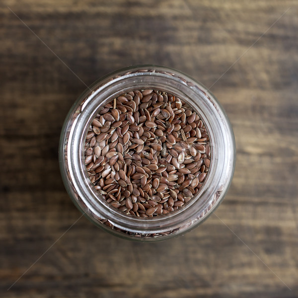 flax seeds in glass jar Stock photo © nessokv