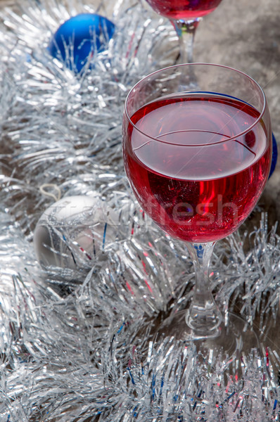 Stock photo: Two glasses of Red Wine and Christmas Ornaments