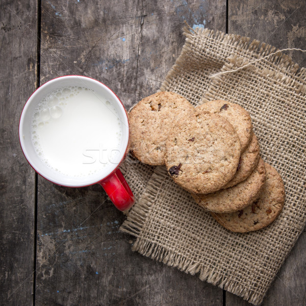 Cookies sopra latte Cup tavolo in legno cioccolato Foto d'archivio © nessokv