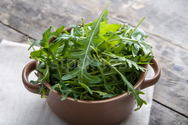 bowl of green salad with arugula Stock photo © nessokv